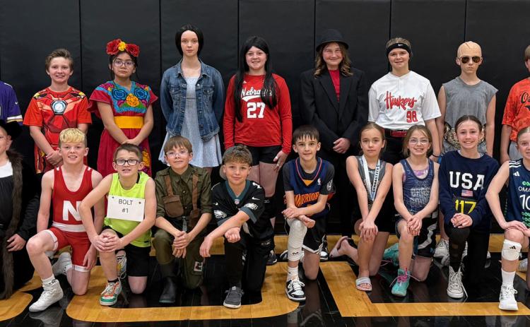 Above: The fifth graders at Osceola do a wax museum each year where they tell about a famous person. PCN photo by Rick Holtz.