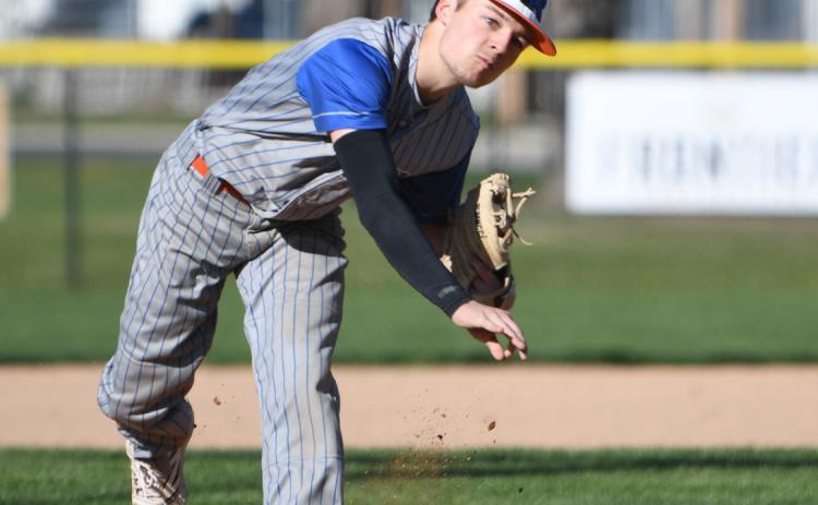 Brayden Santos delivers the pitch towards home plate. The Titans dropped a pair of state ranked matchups this past week. PCN file photo by Rick Holtz.