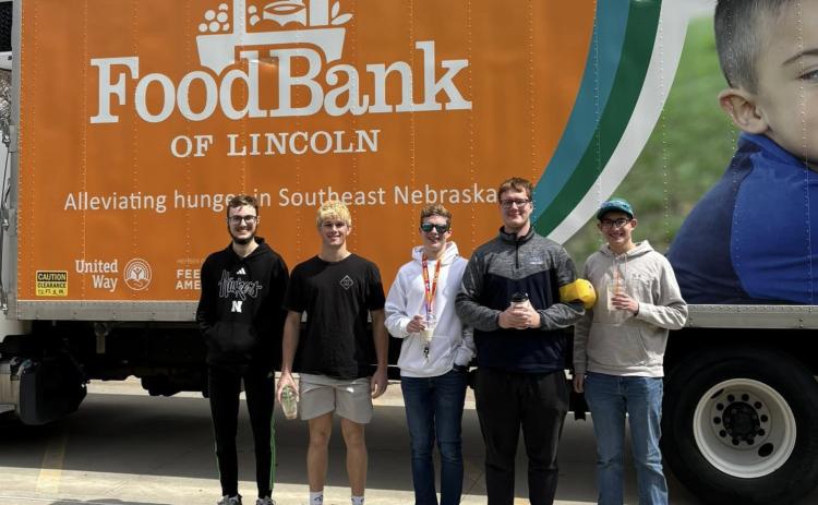 Cross County National Honor Society has been serving Stromsburg, one way by delivering meals on wheels. Monday, April 6th, these young men help unload the FoodBank truck from Lincoln, which supplies food for the backpack program. Pictured are Kirk Sparrow, Jed Berggren, Sam Haug, Cannen Mooney and Colton Duncan. Photo provided.