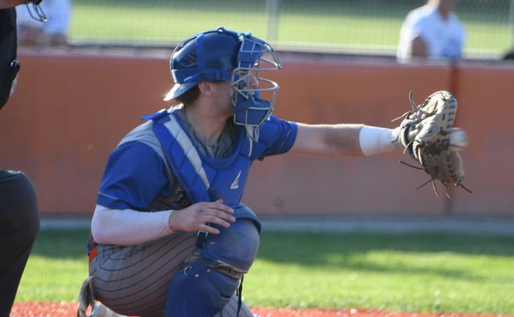 Twin River catcher Aden Feezell receives the pitch in last Thursday’s District opening loss to Lincoln Lutheran in extra innings. The Titans season ended with a record of 7-9. PCN Photo by Rick Holtz.