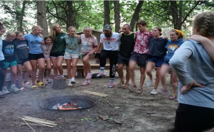 Having fun around the campfire at Timberlake Camp. Photo provided.