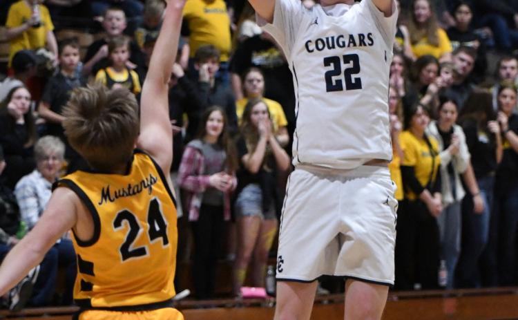 Kole Crawford shoots a trey in the game against McCool Junction. He was 3 for 3 on three-pointers in that game. PCN photo by Rick Holtz.