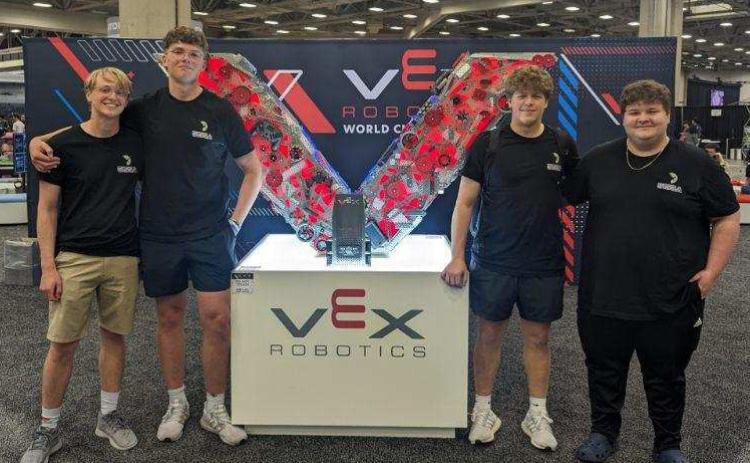 Top: 5155A at World Championships in Dallas: Mason Lindburg, Dane Holtzen, Andrew Dubas and Brett Williams.