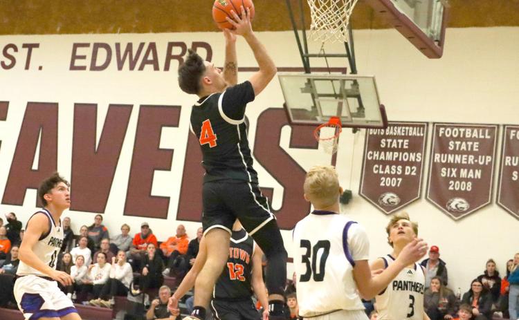 Osceola senior Brayden Santos goes for a basket against NG/ SE. PCN photo by Blaine Winslow.