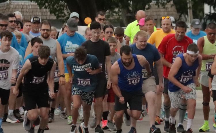 The first wave of runners left the starting line at 8 a.m. on Saturday morning. PCN photo by Ken Kush