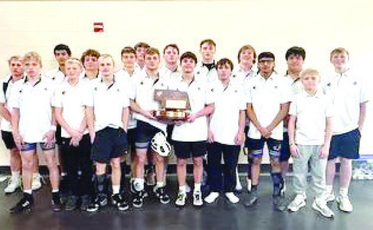 The SRC Huskies placed 4th at Nebraska State duals in Kearney last Saturday. They are pictured with their award. Photo provided.