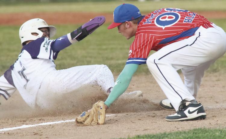 SOS’ Ruger Webb beats the tag as he slides into third base during Friday night’s game against David City in Silver Creek at the Ralph Jilg Baseball Tournament. PCN photo by Ken Kush.