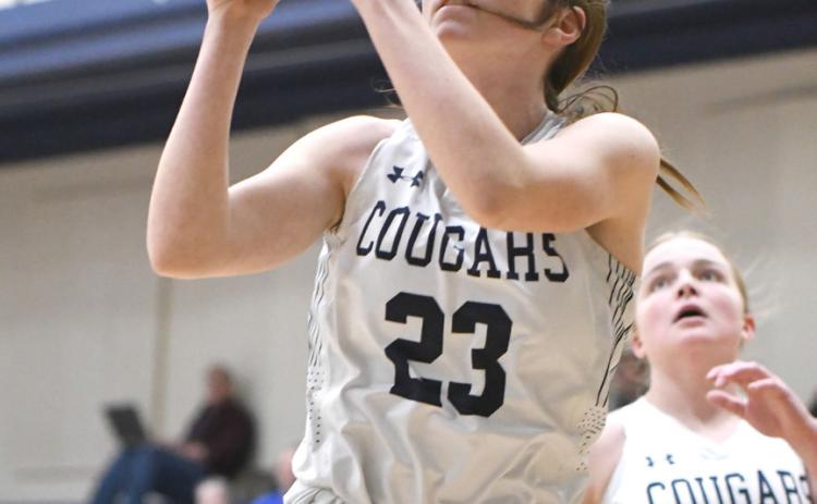 Lindee Kelley goes in for a layup for Cross County. PCN photos by Rick Holtz