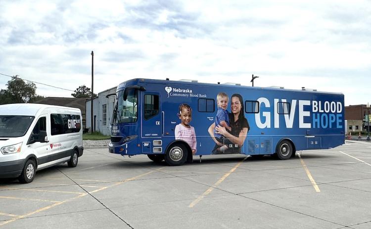 Above: The Nebraska Community Blood Drive Bus stopped in Stromsburg to collect blood from donors. The damage to the bus was on the other side. Photo provided.