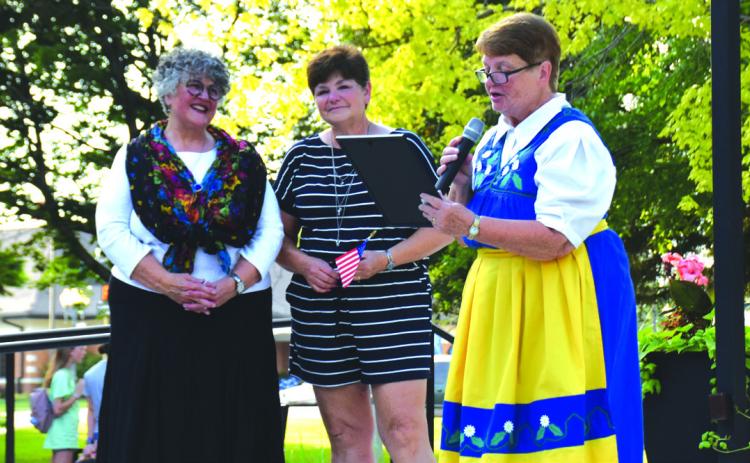 Top: Judy Rieken (center) was named Honorary Swede, presented by Marla Teegerstrom (left) and Sue Lehn (right) Below: Karl and Diane Eckert (right) were named Super Swedes; award presented by Diane Nielsen and Jan Randell. PCN photos by Beth Sparrow.
