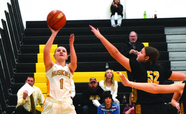 Taya Pinneo shooting one against McCool Junction. PCN photo by Beth Sparrow.