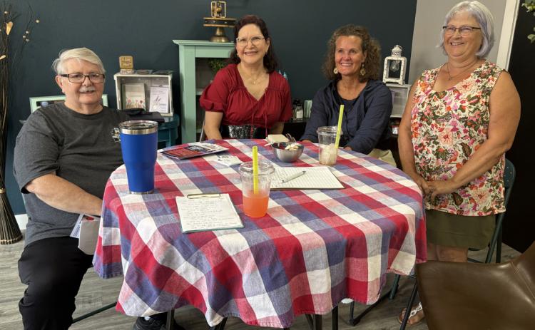 Above: State Senator Jana Hughes held “coffee and conversation” on Wednesday (July 15th) in Osceola (morning) and Shelby (afternoon, pictured).Here she visits with Shelby residents George Thelen, Maru Whitmore and Deb Schmid. PCN photo by Beth Sparrow.