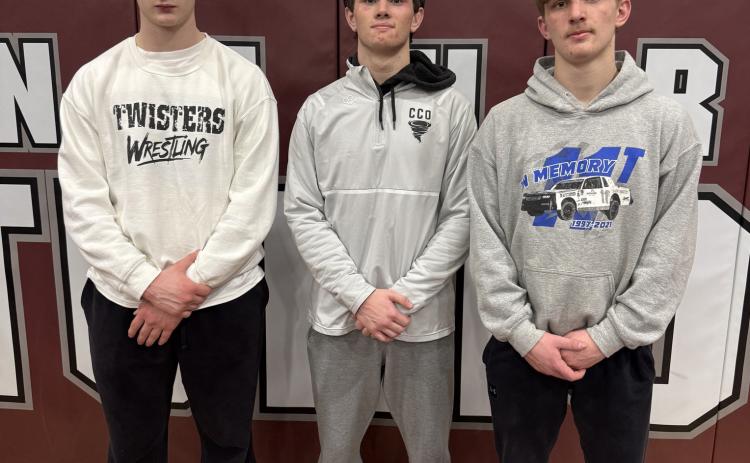 The Cross County/Osceola Twisters boys wrestling team competed at the C-3 District at Centura High School on Saturday. CC/O qualified three wrestlers to compete in this weeks Class C State Tournament which gets underway on Thursday. L-R; Paxton Burke, Jed Berggren and Brayden Nuttelman will represent CC/O. PCN photo by Travis Lane.