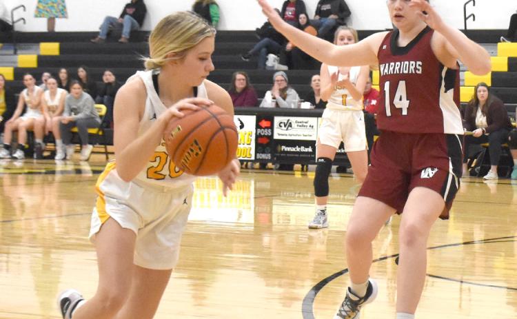 Danica Watts looks to drive past the Fullerton defender in the opening round of the SRC Holiday Tournament on Wednesday. PCN photo by Beth Sparrow