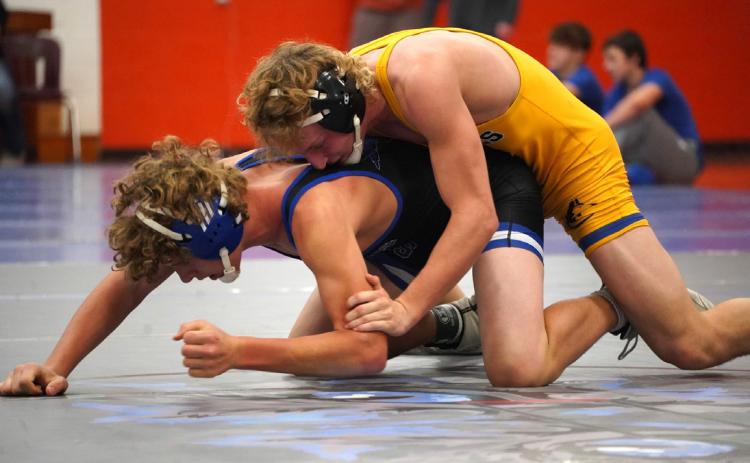 Logan Lindsley wrestles his opponent at the North Bend Invite. PCN file photo by Jen Vrbka.