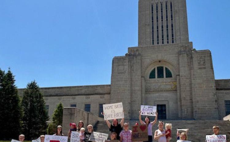 Above: A rally was held on the steps of the Capitol in Lincoln for the bill on midwives on Friday. Photo provided.