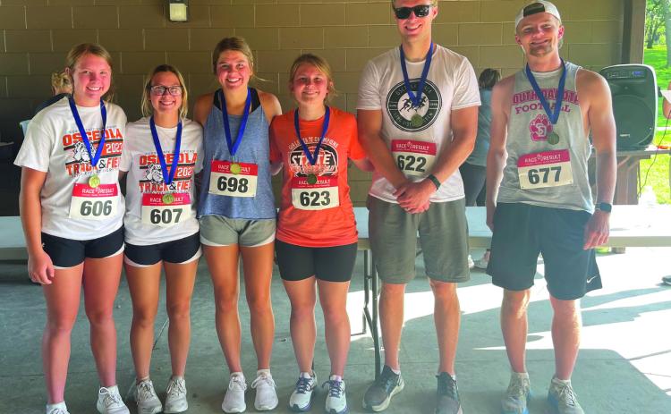 Winning the 5K fun run sponsored by Pinnacle Bank in Osceola were some Osceola track members and coaches including two current track athletes, three former distance crew legends and one proud coach. Pictured is Savanna Boden, Sierra Boden, Addie Theis, Miranda Ericson, Luke Ericson, and Thad Rathjen. Photo provided.