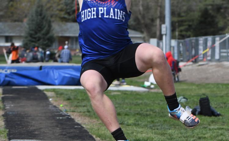 Left: Gage Friesen (HPC) leaped 17 feet for fifth place in long jump