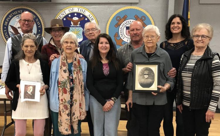 Above: The Gestrines and Hopkins families gathered in Wichita, Kansas to celebrate their war heroes, who died together in World War I. Niece Karen Gestrine is second from right in the front row. Below: A photo of Frank Severt Gestrine taken around his time in the war. Photos provided by Karen Gestrine (niece).