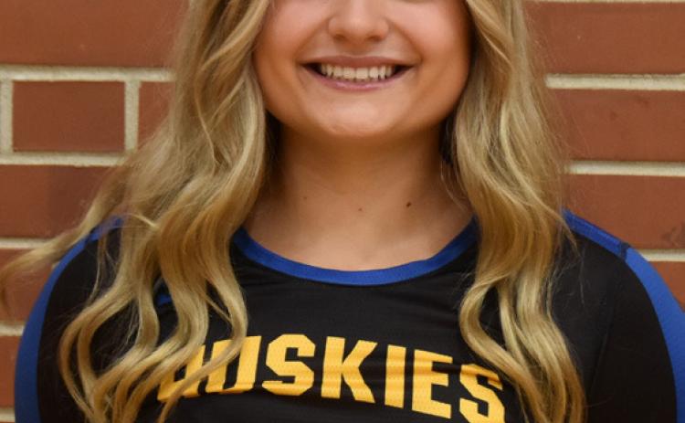 Lady Huskies Return Players with New Coach