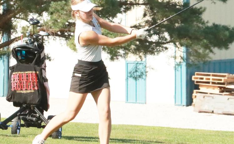 Shelby-RC’s Charlotte Slusarski hits her appraoch shot to the No. 6 green and Fox Hollow last Thursday during the Sutton Invite. Slusarksi finished with a 120. PCN photo by Ken Kush.