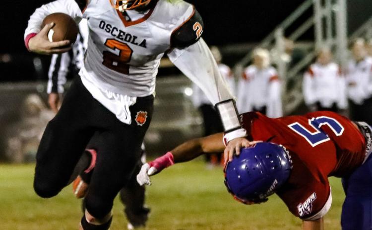 Gustafson adds to his rushing yards Friday at Clarks against High Plains. PCN photo by Blaine Winslow.