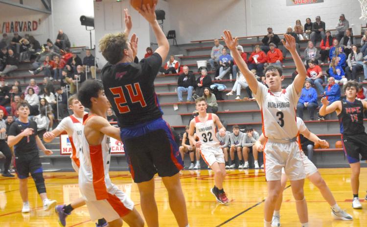 High Plains senbior Chase Owens (24) elevates and puts up the medium range jumper duringf Friday night’s game in Harvard between the Giltner/Harvard Hornets. Owens contributed seven points in the Storm’s win. PCN photo by Beth Sparrow.