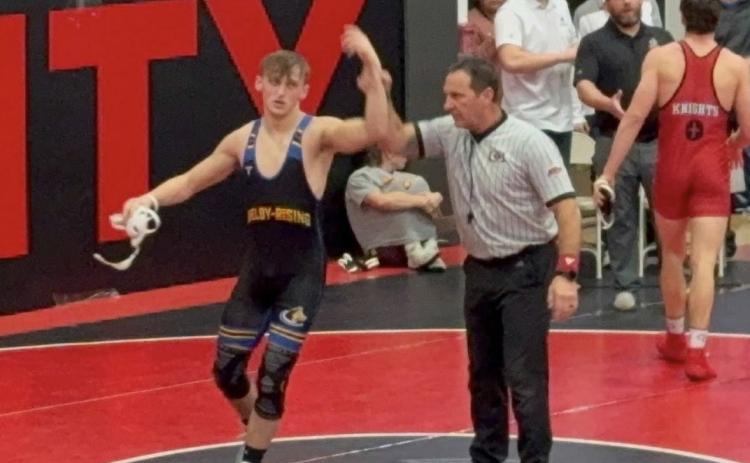 Shelby-RC junior Jett Vrbka gets his hand raised after his semifinal win. Vrbka captured gold at the David City Invite on Friday, defeating No 1 Griffin Bergen of Sutton in the finals 4-0. Photo was provided.