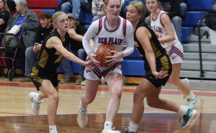 High Plains senior Peyton Hofmann drives right through the teeth of the McCool Junction defense in last Thursday night’s game in Polk. PCN photo by Ken Kush.