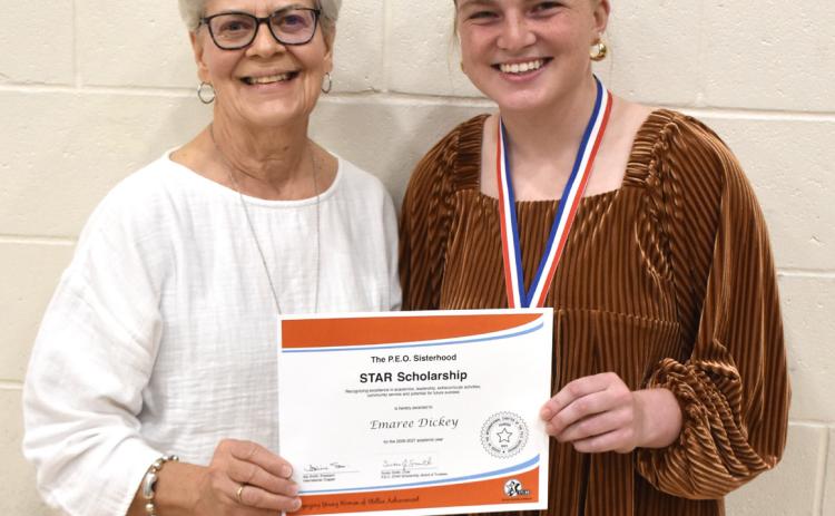 Muriel Lindburg of Chapter AR P.E.O. Stromsburg presented Ema Dickey with the STAR scholarship. PCN photo by Beth Sparrow.