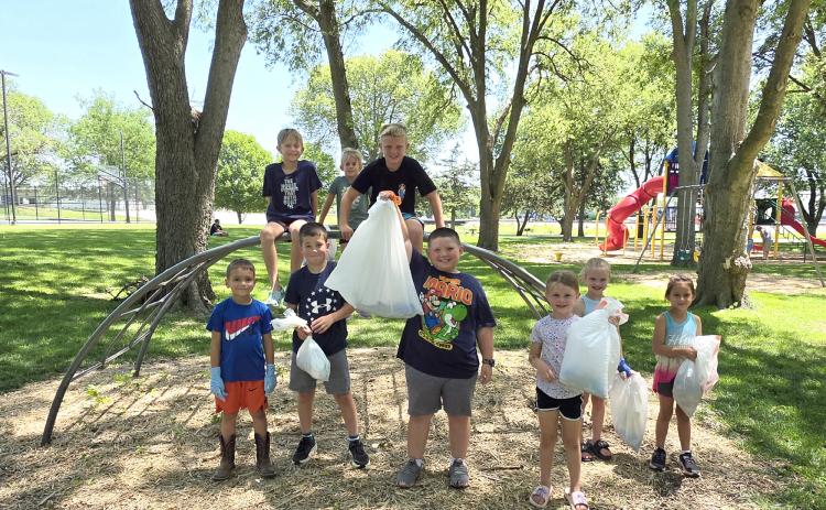Members of the newly established Clover Roots 4-H Club recently spent the day giving back to their community by picking up trash and sticks at the Osceola park. Despite the hot weather, the members worked hard with positive attitudes to help clean and improve the park for everyone to enjoy. The club is proud to serve its community and looks forward to participating in more community service projects throughout the year. Photo provided.