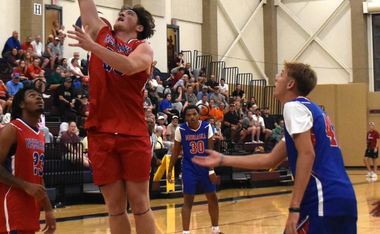 Kale Gustafson (pictured here going for a rebound) played in the Nebraska Coaches Association All-Star game in Lincoln last Wednesday. He was on team red, who won the game 132-122. Gustafson grabbed 5 rebounds and put in 6 points, according to PCN stats. PCN photo by Beth Sparrow.
