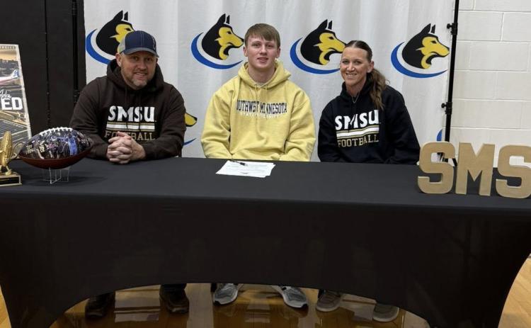 Coy Vrbka will be attending Southwest Minnesota State University next fall where he will further his education in Ag Business and play football for the Mustangs. Here at the signing (L-R) is his dad Heath, Coy and his mom Kelsey. Photo was provided