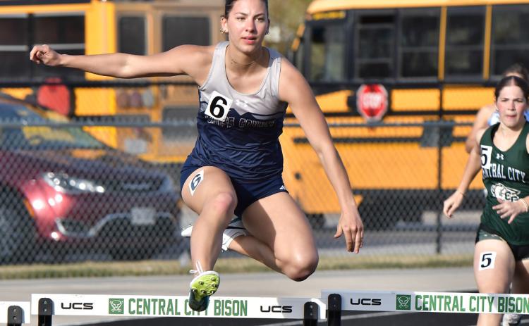 Saphira Osentowski competes in the 300 meter low hurdles at the Merrick County Invite. She placed second in the event on Thursday at the Thayer Central Invite. PCN file photo by Rick Holtz.