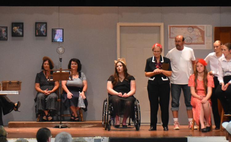 Osceola Community Players presented “Unsound Effects”. Pictured is Jenni Erhart (director) front, talking to the audience. Also pictured is most of the cast: Dave Rinehart, Suzanne Peterson, Connie Kramer, Hayden Lavaley, Evan Feezell, Kendra Gustafson, Gail Channer, Debbie Girard, Erica Burritt, Roxanne Page, Mark Erhart, Makenzie Kuns, Layla Page, Kimbree Page, Blair Page, Clare Willis, Clyde Ericson and Payton DeMers-Sahling. PCN photo by Beth Sparrow.
