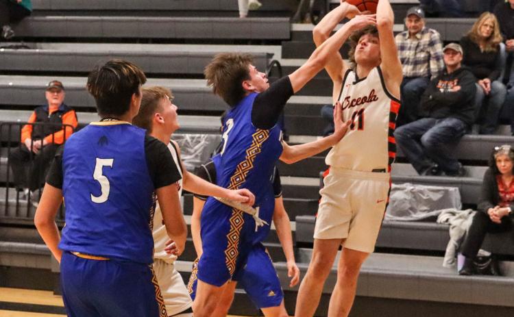 Cash Valish getting fouled on this attempt at a basket. PCN photo by Blaine Winslow.