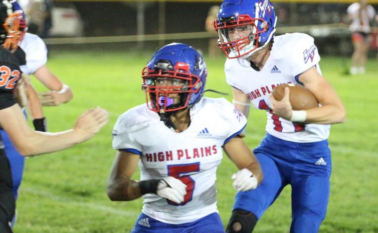 Gavin Morris carries the ball while Raul Marino blocks for him. PCN photo by Travis Lane.
