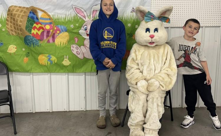 Above: Jeter and Beckett Zelasney visited the Easter Bunny at Osceola’s Easter Egg Hunt. Osceola moved their hunt inside to the fairgrounds due to the wet weather. Photo provided. Below: Kids hunted for eggs and prizes in Shelby at their annual Easter Egg Hunt. Kids were divided into three groups: PreK went first, K-1st went second and 2nd-3rd went last. All were at the ball park in different locations. PCN photos by Beth Sparrow.