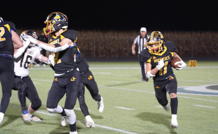 As a sophomore, Shelby-RC’s Carter Eickmeier (11) anchored the Huskies run game as he totaled 1,362 yards on 182 carries, averaging 151 yards per game. PCN file photo