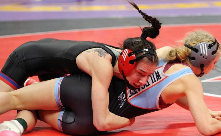 Dakota Gress (HPC) wrestles at state. She placed fourth. PCN photo by Travis Lane.