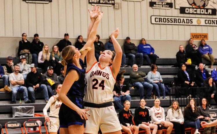 Osceola junior Bella Recker (24) put the Bulldogs on her back on Saturday, scoring 26 points and leading the Bulldogs to the 50-45 win over Twin River. PCN photo by Blaine Winslow