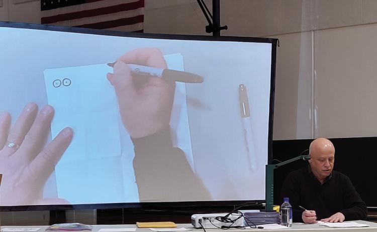 Bruce Arant stopped by Shelby-Rising City schools last week and talked to students, showing them different techniques for illustrating a story. PCN photos by Beth Sparrow
