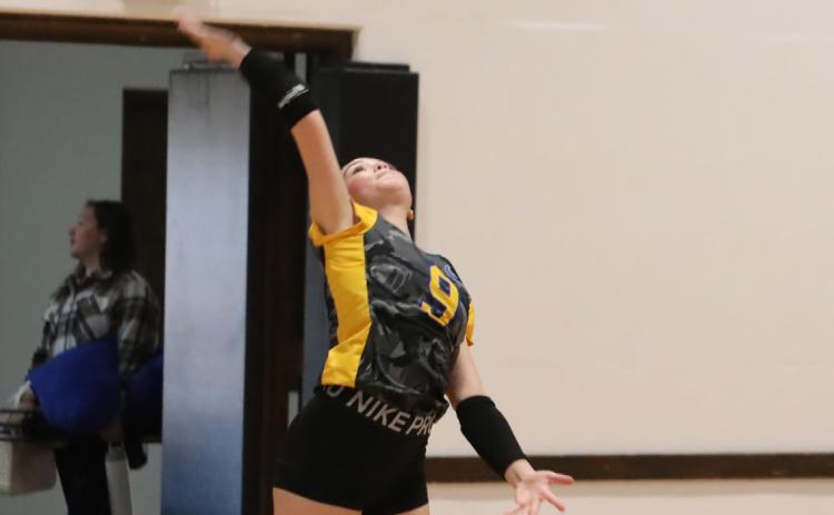 SRC’s Khloe Trujillo (9) strong run at the service line in the third set helped to key the Huskies win over the High Plains Storm 2-1.PCN photo by Ken Kush.