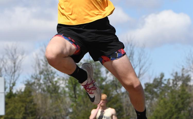 Above: Coy Vrbka (SRC) made a jump of 16 feet 1.25 inches in long jump at districts. PCN photo by Rick Holtz.