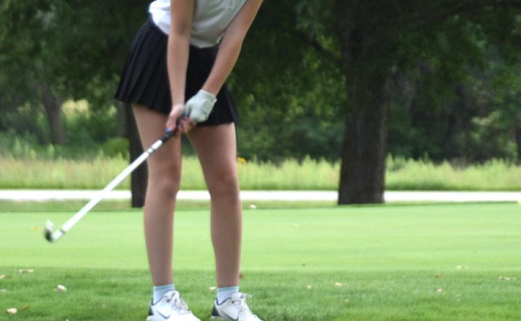 Clare Willis gets ready to chip her ball on the green. Photo provided by SRC.
