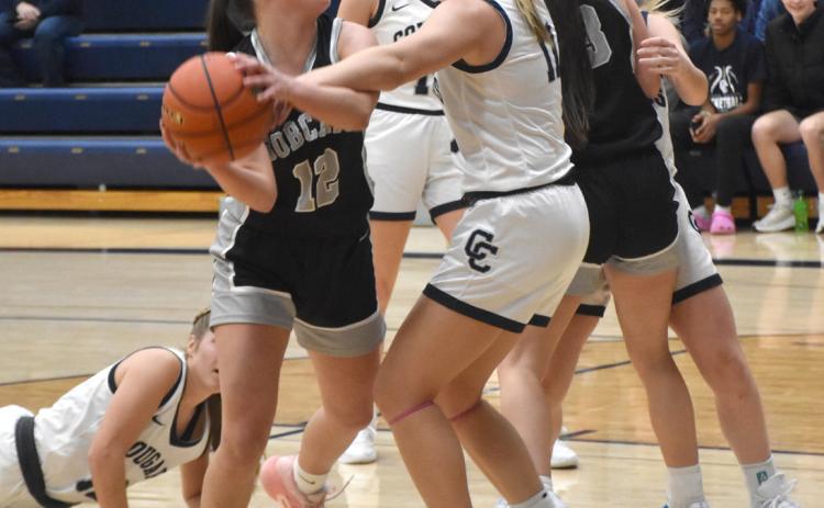 Cross County senior Ella Clark locks down on defense against the EMF offensive player last Thursday night. PCN photo by Beth Sparrow.