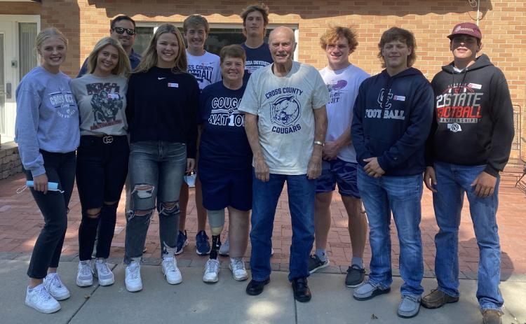 Bren Lemburg (left), Taylor Lindburg, Mr. Jimmy Blex, Jayden Fellows, Ashton Seim, Sue Lehn, Tanner Hollinger, Larry Lehn, Izaac Dickey, Andrew Dubas, Treven Nienhueser. Larry Lehn (and wife Sue) were visited by Cross County athletes and presented with a Cougar T-shirt as one of MCH’s Fan of the Week. T-shirt provided by Cross County Booster Club. Photo provided by Erin Dickey.