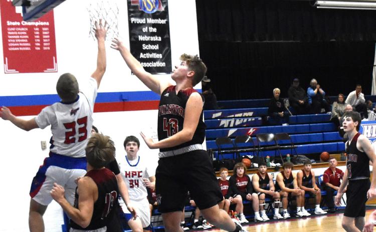 Brodey Spurling (#23) goes up for the rebound against Fullerton’s Hunter Gochenour. PCN photo by Beth Sparrow.