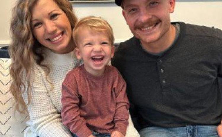 Brittney Pflueger will be the new activities director at Shelby-Rising City. She is pictured with her husband and son. Photo provided.