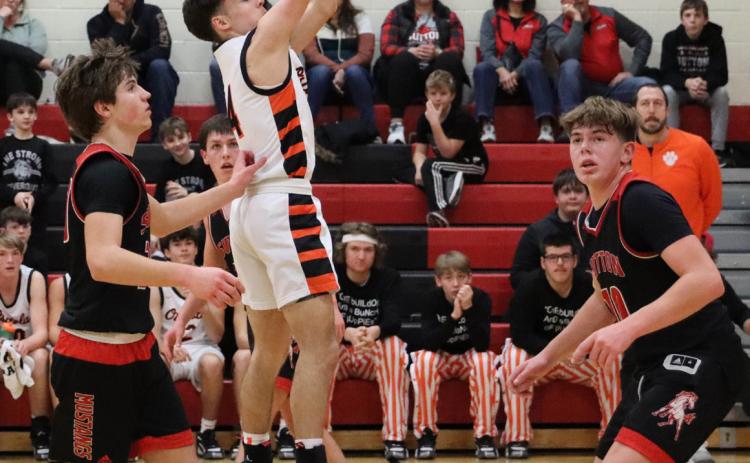 Brayden Santos takes the shot against Sutton. PCN photo by Blaine Winslow. 9, B. Mestl 8, H. Prososki 5, B. Hinkle 3, C. Sterup 2, J. Winslow 2. Rebounds: K. Gustafson 18, K. Neujahr 8, B. Mestl 6, H. Prososki 5.